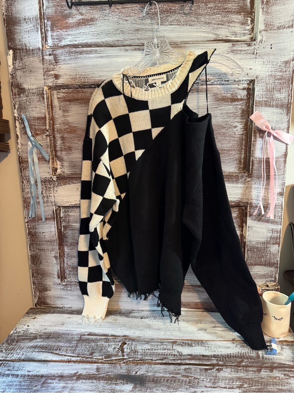 Dance & Marvel Black and Cream Checkerboard Off-Shoulder Sweater